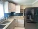Cozy kitchen with stainless steel appliances and ample countertop space at 2044 7Th Ave, Deland, FL 32724