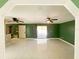 Inviting living room featuring ceiling fans and access to outdoor area at 2044 7Th Ave, Deland, FL 32724