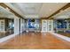 Bright, open gym with hardwood floors, large mirrors, and exercise equipment including workout balls at 241 Riverside Dr # 207, Daytona Beach, FL 32117