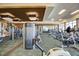 Bright community gym with modern fitness equipment and mirrors at 241 Riverside Dr # 207, Daytona Beach, FL 32117