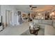 Comfortable living space with a cozy couch, open to the kitchen, blending living, dining, and cooking areas at 241 Riverside Dr # 207, Daytona Beach, FL 32117
