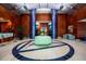 Grand lobby featuring elegant columns, decorative lighting, and seating area, offering a luxurious welcome at 241 Riverside Dr # 207, Daytona Beach, FL 32117