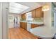 Charming kitchen with a cozy breakfast nook, modern appliances, and wood flooring at 28 W Highbanks Rd, Debary, FL 32713