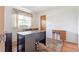 Bright office space featuring a desk, vintage desk, and an area rug at 28 W Highbanks Rd, Debary, FL 32713