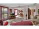Cozy living room featuring comfortable seating, a TV, and an open layout connecting to the dining area at 29 Ramblewood Trl, Deland, FL 32724