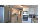 Well-maintained kitchen featuring modern appliances and ample cabinet space with a neutral color palette at 3003 S Atlantic Ave # 19B4, Daytona Beach, FL 32118