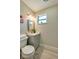 Cozy bathroom features modern fixtures and a window for natural light at 302 Lafayette St, Port Orange, FL 32127
