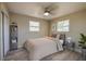 Bedroom staged with bed, end table, bookshelf and modern decor at 302 Lafayette St, Port Orange, FL 32127