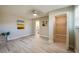 Spacious bedroom features a ceiling fan, closet, and ensuite bathroom at 302 Lafayette St, Port Orange, FL 32127