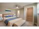 Comfortable bedroom features modern furnishings and ensuite bathroom at 302 Lafayette St, Port Orange, FL 32127