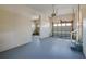 Large garage with gray sealed floor and white walls at 302 Lafayette St, Port Orange, FL 32127