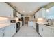 Bright kitchen features stainless steel appliances and quartz countertops at 302 Lafayette St, Port Orange, FL 32127
