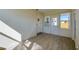 Sunroom featuring tile flooring and lots of natural light from surrounding glass doors and windows at 302 Lafayette St, Port Orange, FL 32127