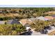 Aerial view of a well-maintained home with mature trees and landscaping in a residential neighborhood at 307 Heron Point Way, Deland, FL 32724