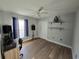 This bedroom offers a ceiling fan and hardwood floors, complemented by neutral paint on the walls at 3209 S Dorchester Dr, Deltona, FL 32738