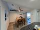 Bright dining area with modern decor and an easy access to a patio at 3209 S Dorchester Dr, Deltona, FL 32738