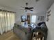 Relaxing living room features a large sectional sofa and a cozy atmosphere at 3209 S Dorchester Dr, Deltona, FL 32738