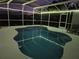 Screened pool with ambient lighting, offering a relaxing and inviting space for evening swims and gatherings at 3209 S Dorchester Dr, Deltona, FL 32738