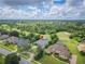 A beautiful neighborhood with lush trees with a golf course nearby at 369 Caddie Dr, Debary, FL 32713