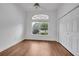 Hardwood bedroom features a ceiling fan and window at 369 Caddie Dr, Debary, FL 32713