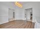 Dining room featuring hardwood floors and open access to other living areas at 369 Caddie Dr, Debary, FL 32713