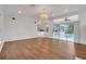 Living Room with hardwood floors, pool views and open to the kitchen at 369 Caddie Dr, Debary, FL 32713
