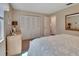 Inviting bedroom featuring a comfortable bed, spacious closet, and serene ambiance at 37 Fairway Ct # C, Deland, FL 32724