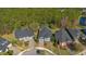 Aerial view of the blue home nestled among other homes in a well-planned community at 376 Chelsea Place Ave, Ormond Beach, FL 32174
