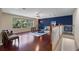 A bonus room area featuring wood floors, tall ceilings, exercise equipment and natural light at 376 Chelsea Place Ave, Ormond Beach, FL 32174
