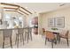 Charming dining area with breakfast bar, adjacent to kitchen, is great for both casual meals and formal gatherings at 376 Chelsea Place Ave, Ormond Beach, FL 32174