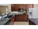 Well-equipped kitchen with granite countertops, stainless steel appliances, and ample cabinet space at 376 Chelsea Place Ave, Ormond Beach, FL 32174