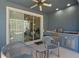 Outdoor lanai featuring a ceiling fan and an outdoor kitchen at 376 Chelsea Place Ave, Ormond Beach, FL 32174