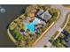 The community swimming pool offers a refreshing escape with ample seating, landscaping, and a nearby playground at 376 Chelsea Place Ave, Ormond Beach, FL 32174