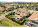 Aerial view of the home highlighting the backyard pool area, patio and mature landscaping at 3955 Equine Cv, Lake Mary, FL 32746