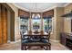Charming breakfast nook with bay windows overlooking the pool at 3955 Equine Cv, Lake Mary, FL 32746