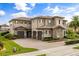 Attractive home boasts a spacious driveway, attached garage, and manicured lawn at 3955 Equine Cv, Lake Mary, FL 32746