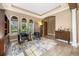 Living room area offers ample natural light through large windows and comfortable seating arrangements at 3955 Equine Cv, Lake Mary, FL 32746