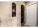 View of a wine cellar with wrought iron gate and window, and beige walls at 3955 Equine Cv, Lake Mary, FL 32746