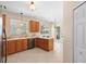 Kitchen featuring a view of the backyard and a tiled floor at 406 Ravenshill Way, Deland, FL 32724