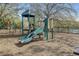 Neighborhood playground with slide, climbing wall, and other playground equipment at 406 Ravenshill Way, Deland, FL 32724