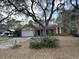 Charming single-story home with a two-car garage and mature landscaping in a quiet neighborhood at 4164 New Marsh Rd, Deland, FL 32724