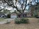 Charming single-story home with a two-car garage and mature landscaping in a quiet neighborhood at 4164 New Marsh Rd, Deland, FL 32724