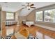 Inviting bedroom featuring hardwood floors, ample natural light and cozy beanbag seating at 427 E Church St, Deland, FL 32724