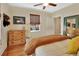 Inviting bedroom with a coastal vibe featuring hardwood floors and a sunny window view at 427 E Church St, Deland, FL 32724