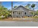 Charming house exterior with well-maintained lawn and street view at 427 E Church St, Deland, FL 32724