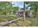 Charming two-story home with landscaped front yard and inviting front porch at 427 E Church St, Deland, FL 32724
