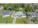 Charming home with large fenced yard, mature trees, and an open lawn at 4333 Arch St, Orlando, FL 32808