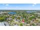 Aerial view of property in a neighborhood near a lake, highlighting its convenient and scenic location at 4333 Arch St, Orlando, FL 32808