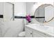 Stylish bathroom showcasing vanity, modern fixtures, decorative tiling, and luxury finishes at 4333 Arch St, Orlando, FL 32808