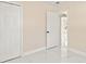 Cozy bedroom with a closet, neutral walls, and marble floors at 4333 Arch St, Orlando, FL 32808